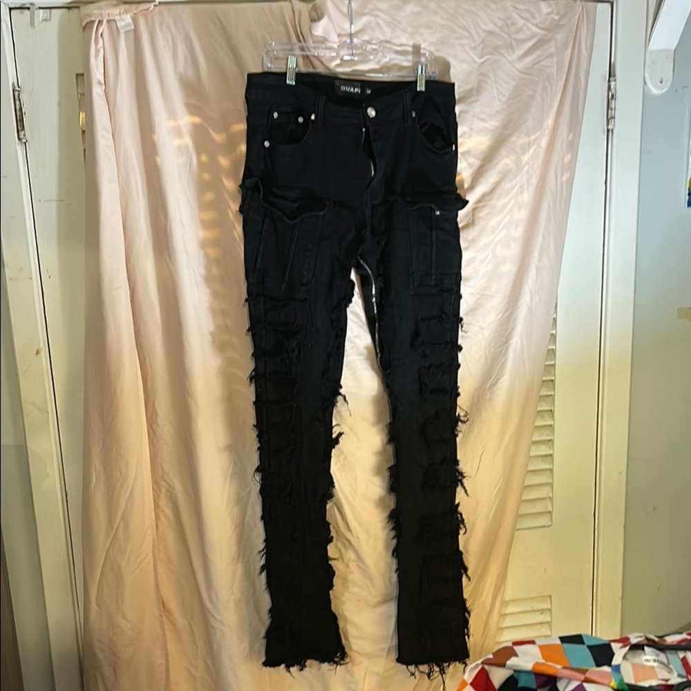 Guapi 
Edgy Black Skinny Jeans with Frayed Side Details